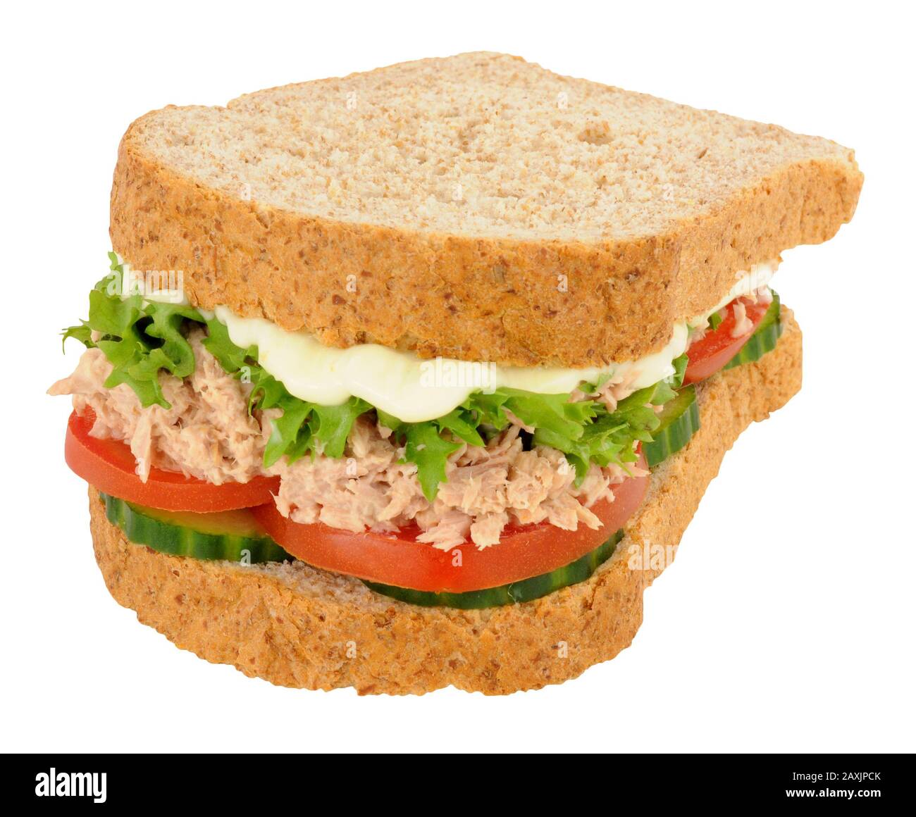 Tuna and salad sandwich on brown sliced bread isolated on a white