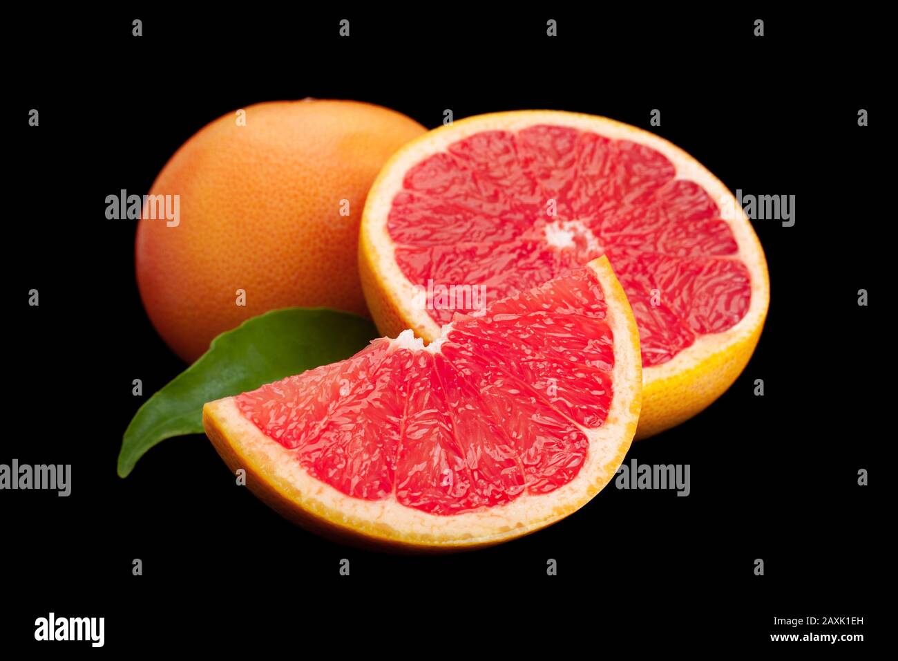 Grapefruit with leaf closeup isolated on black background Stock Photo