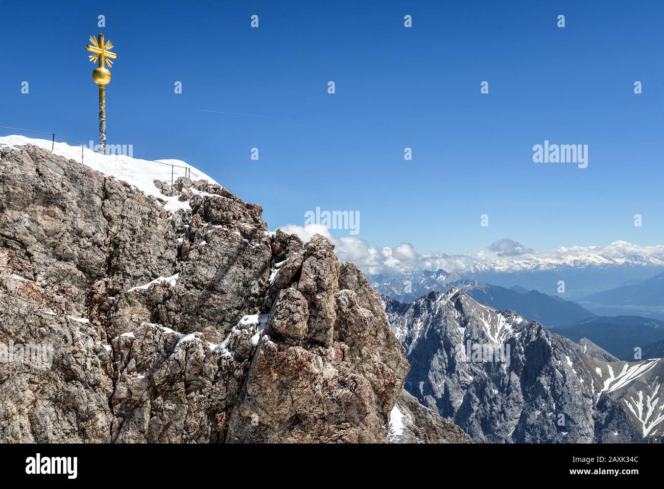 The summit cross on the Zugspitze Stock Photo