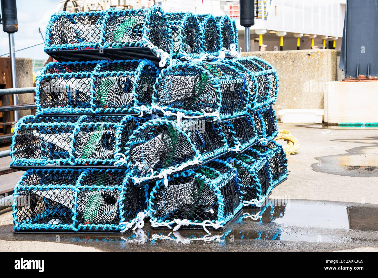 Stack of crab pots on a dock Stock Photo