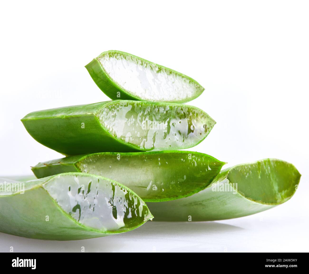 Sliced Aloe Vera closeup. Aloe plant is used as main ingredient for natural organic renewal cosmetics, herbal medicine. Organic skin care concept. Iso Stock Photo