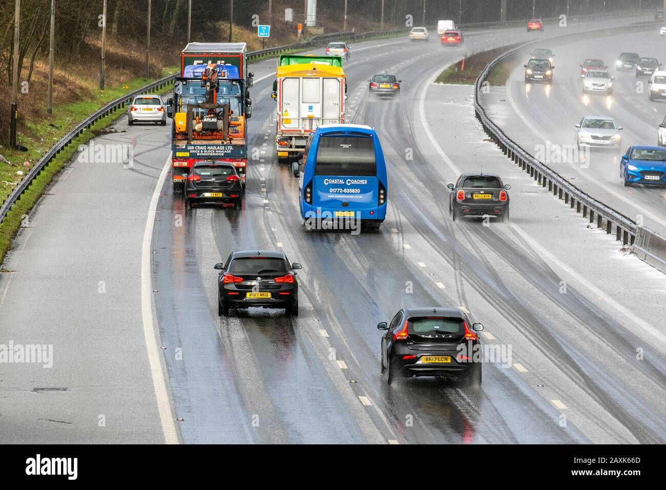 Chorley, Lancashire.  UK Weather. 12th Feb, 2020.  Motorist loses control of vehicle  and crashes on M6 motorway after heavy microburst hailstorm makes for difficult driving conditions. The lucky BMW driver ended up hitting the Armco Crash Barrier, colliding on the hard shoulder and finished facing oncoming traffic. Credit; MediaWorldImages/AlamyLiveNews Stock Photo