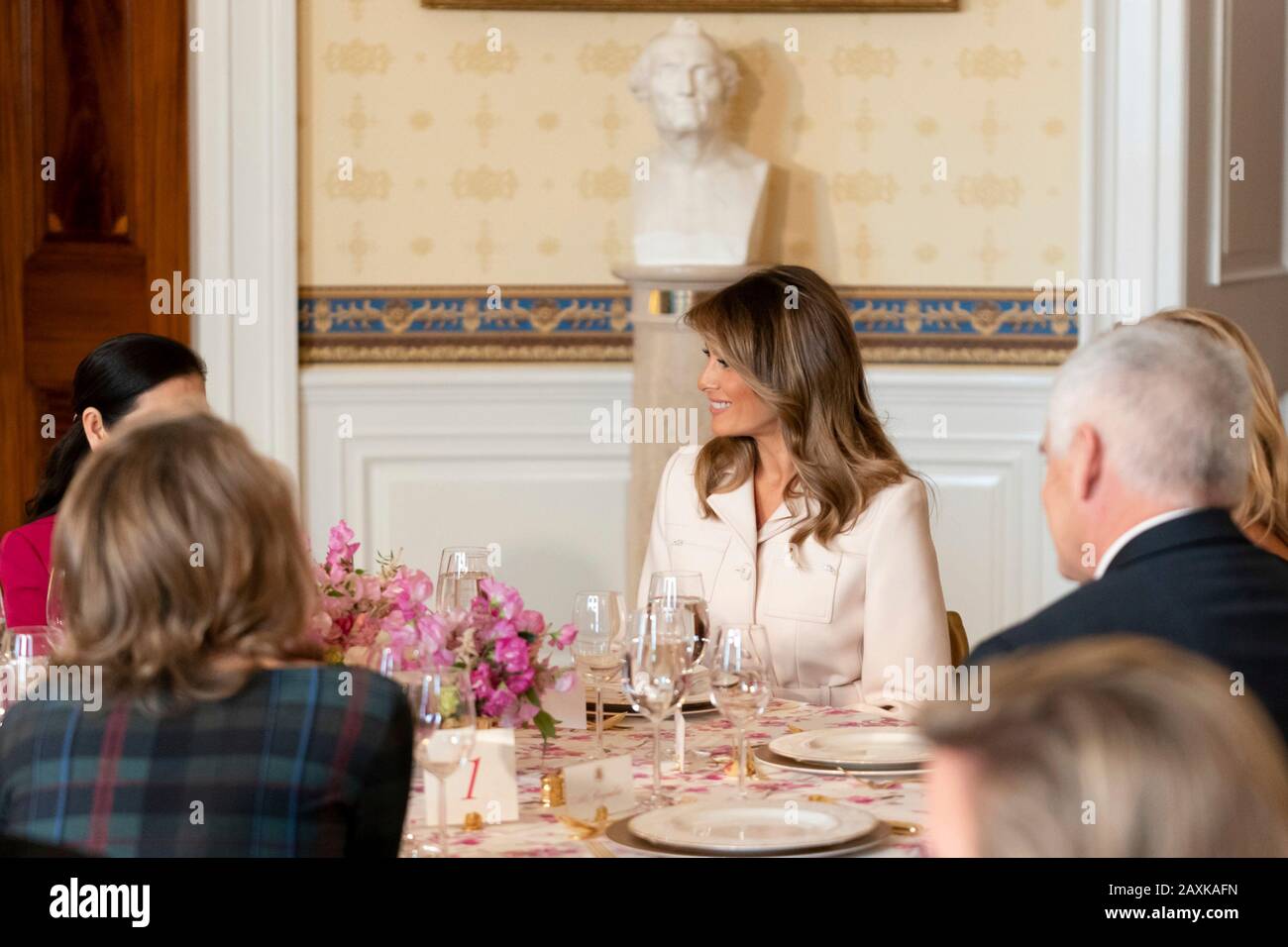U.S First Lady Melania Trump hosts a lunch for spouses during the annual Governors meeting in the Blue Room of the White House February 10, 2020 in Washington, DC. Stock Photo