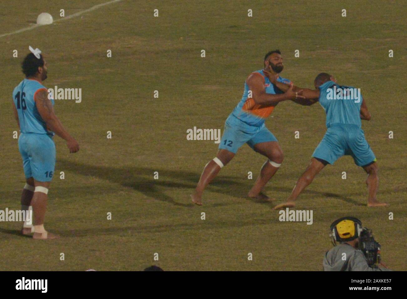 Kabaddi players seem in action during the match playing between India vs Sierra Leone, as Indian Kabaddi team win by 18-45 during Kabaddi World Cup 2020 at Punjab Stadium Lahore. Kabaddi World Cup 2020 begins in Pakistan. All is set for the 'Kabaddi World Cup 2020' being hosted in three cities Lahore, Faisalabad and Gujrat from February 09 to 16 February. respectively. The event is jointly organized by Punjab government, Sports Board Punjab (SBP) and Pakistan Kabaddi Federation (PKF). (Photo by Rana Sajid Hussain/Pacific Press) Stock Photo