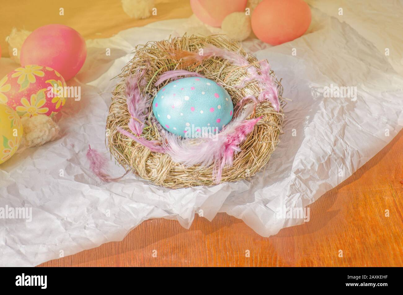 Easter background with blue eggs in nest Stock Photo - Alamy