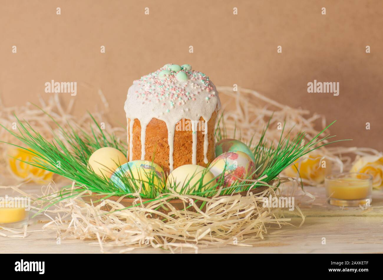 Pastel Easter egg. Pastel colored decorated easter eggs and Easter cake. Pastel colored Easter holiday background. Sweet spring color theme. Easter eg Stock Photo