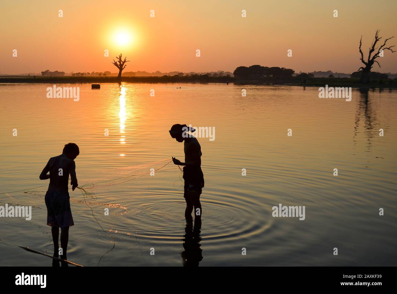 Two boys fishing hi-res stock photography and images - Alamy