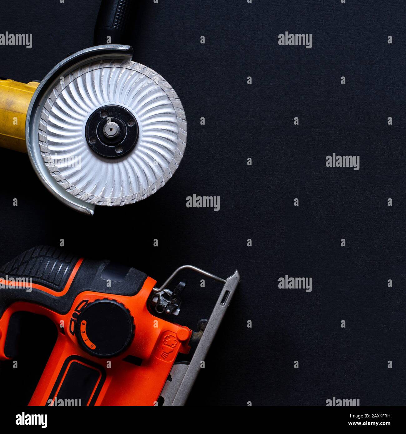 Construction worker tools on a dark background top view. Stock Photo