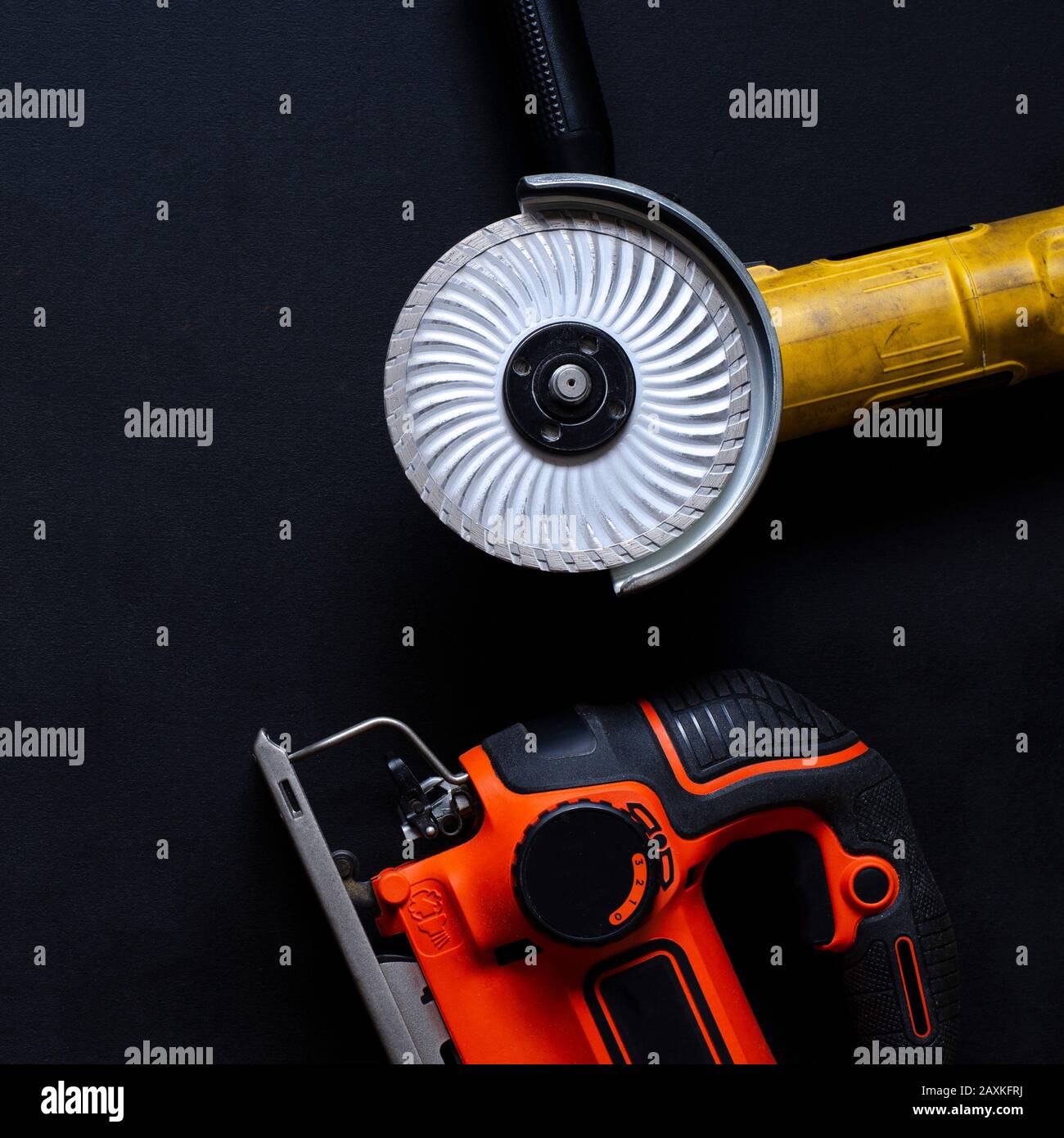 Construction worker tools on a dark background top view. Stock Photo