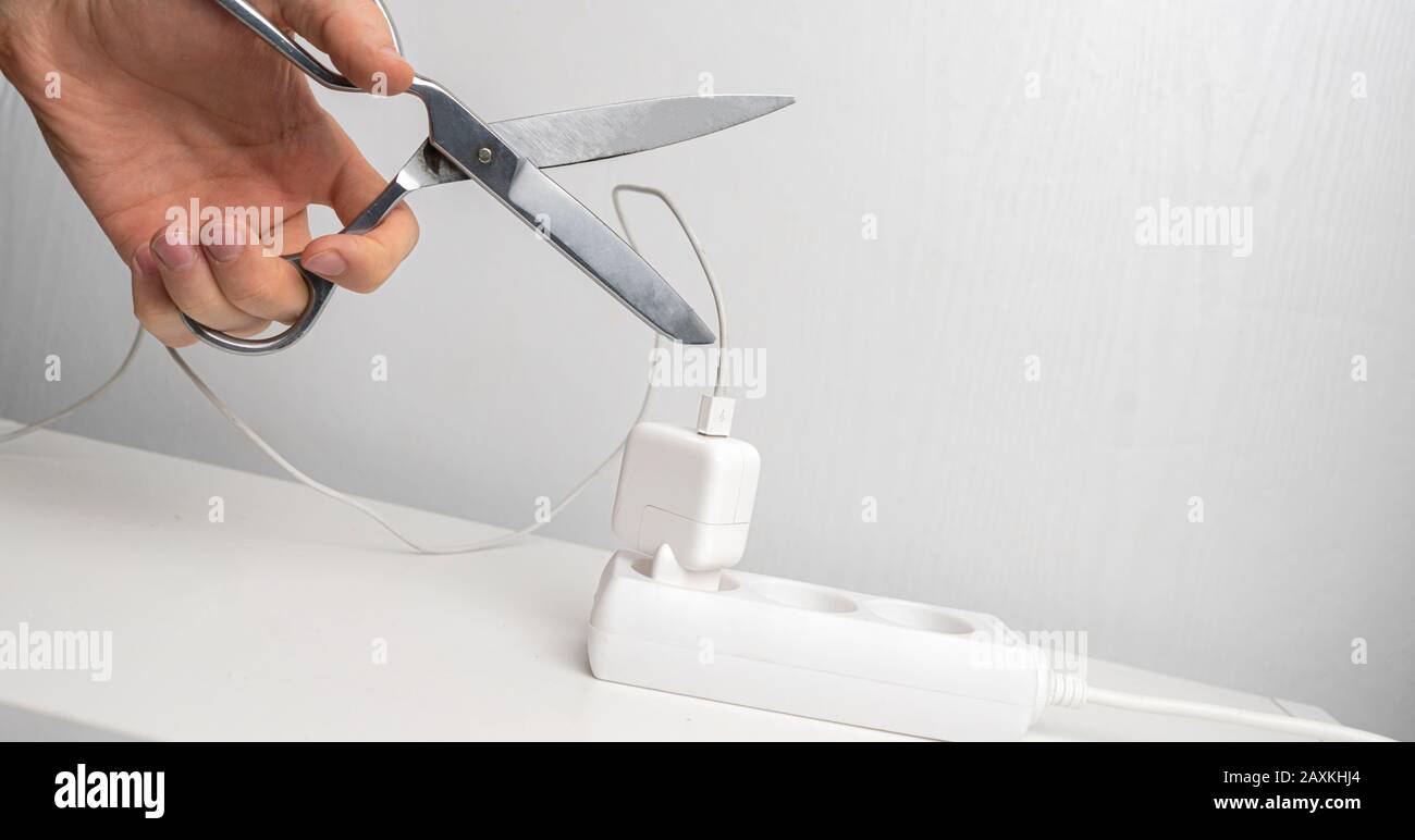 the scissors cut electricity wire, safe the environment concept