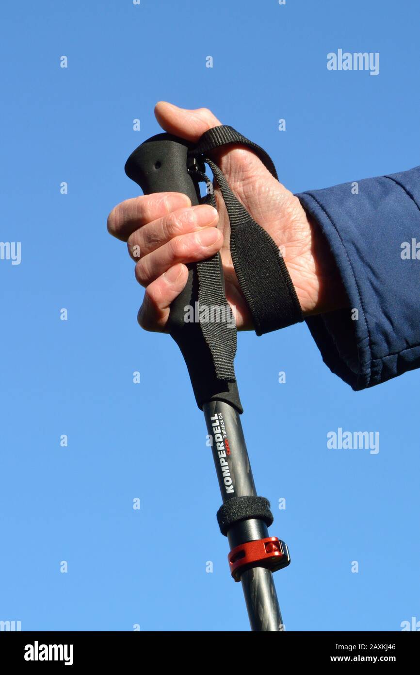 Wrist strap on trekking pole. Incorrect use. Stock Photo