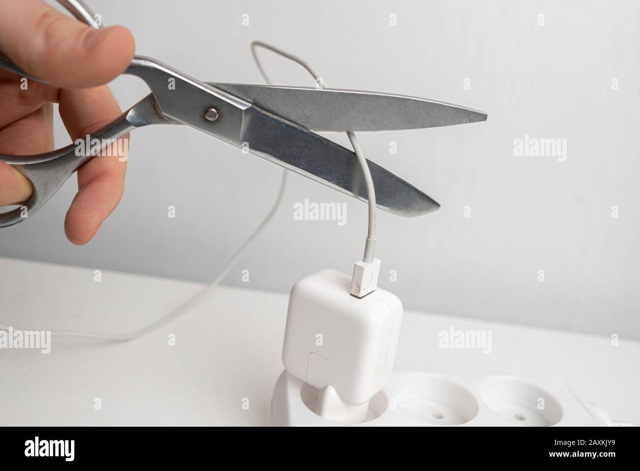 the scissors cut electricity wire, safe the environment concept