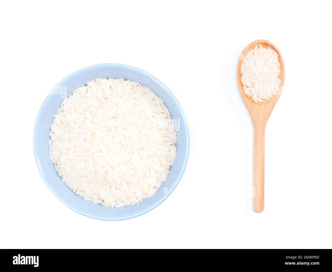 Indian long grain Basmati rice in blue ceramic bowl and wooden spoon ...