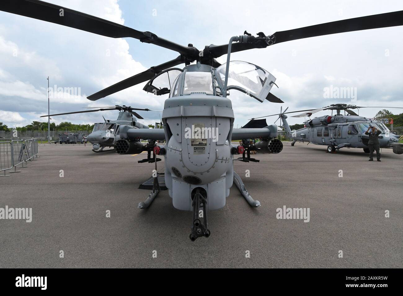 Singapore. 12th Feb, 2020. A U.S. Marines' attack helicopter is on display at the Singapore Airshow held at Changi Exhibition Centre in Singapore, Feb. 12, 2020. Singapore Airshow 2020, Asia's largest aerospace and defense exhibition, kicked off here Tuesday at the Changi Exhibition Centre. Credit: Then Chih Wey/Xinhua/Alamy Live News Stock Photo