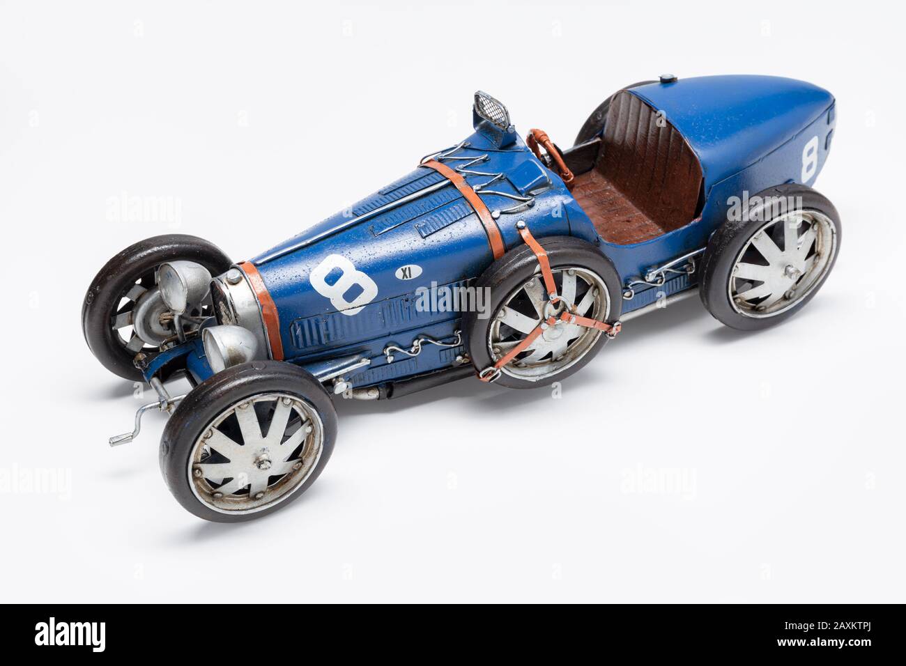 Retro race car tin toy isolated on white Stock Photo