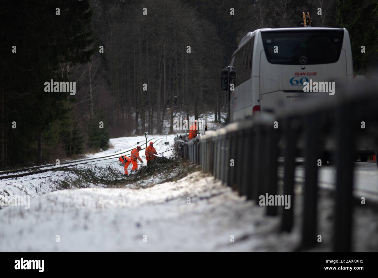 Schierke, Germany. 12th Feb, 2020. Workers are clearing branches from the tracks of the Harz narrow-gauge railway on the section between Drei Annen Hohne and Schierke. The clean-up work on the railway company's tracks had not yet been fully completed by the afternoon. The trains from Wernigerode only went as far as Drei Annen Hohne. Credit: Klaus-Dietmar Gabbert/dpa-Zentralbild/ZB/dpa/Alamy Live News Stock Photo