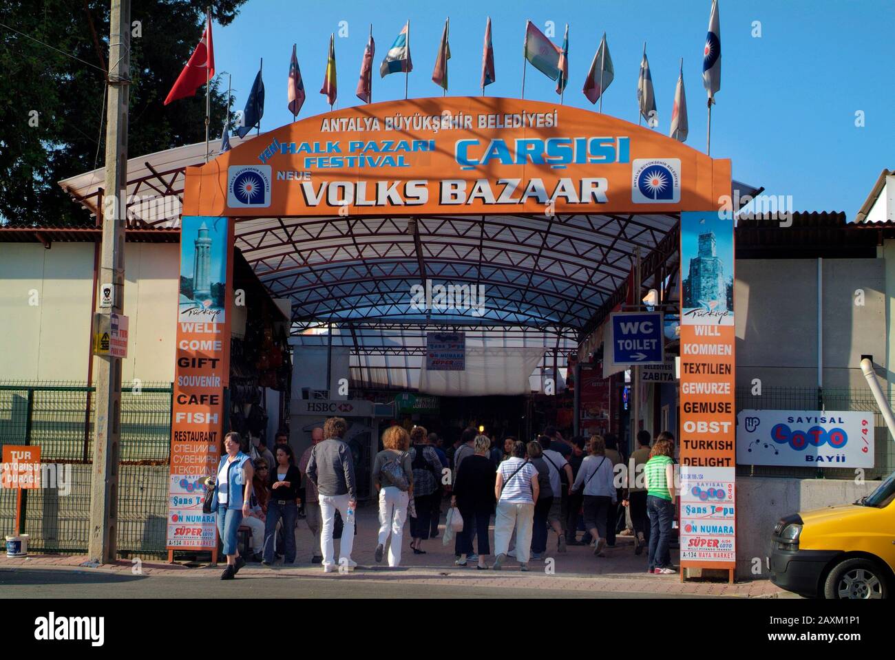 Alanya, Turkey - April 10, 2009: Unidentified people on entrance to big bazaar, shopping mall for tourists Stock Photo
