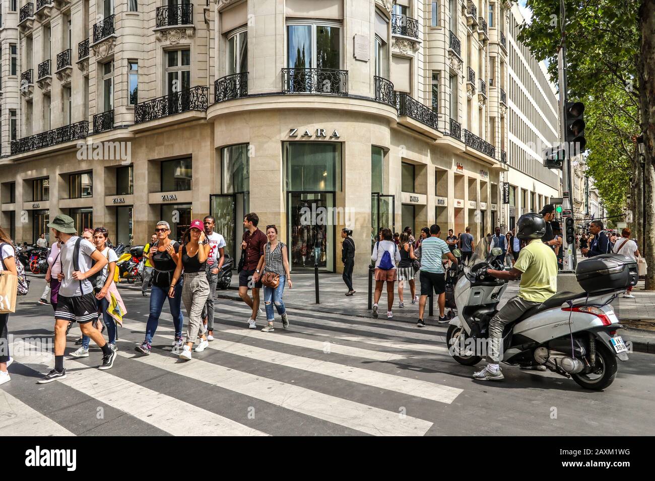 People crossing and Zara store on Champs-Élysées Paris France Europe Stock  Photo - Alamy