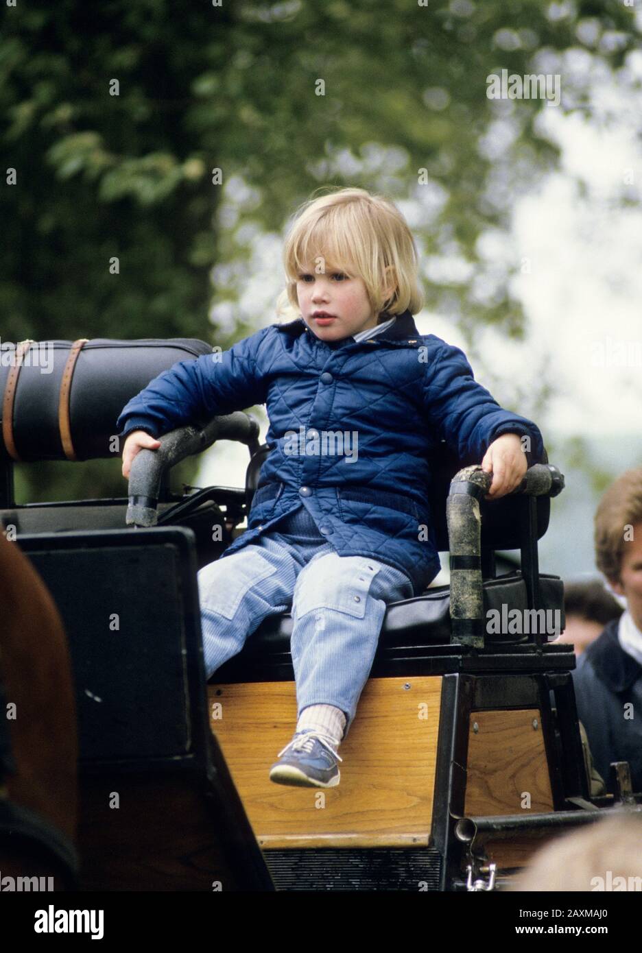 Zara Phillips rides on HRH Prince Philip's driving carriage at The Windsor Horse Show, England, May 1985 Stock Photo