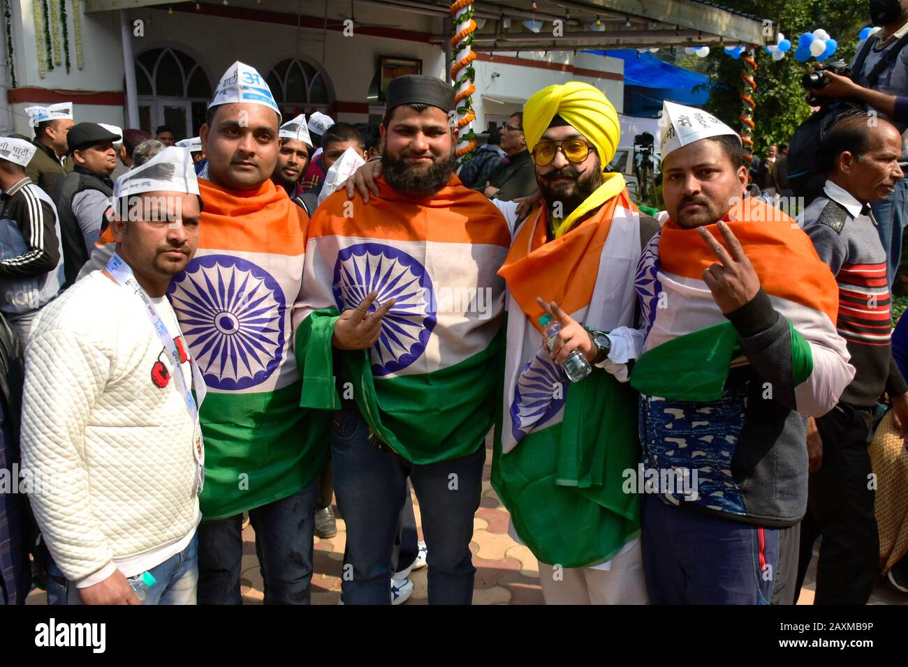 February 11, 2020: Supporters of Aam Aadmi Party (AAP) from different  religions celebrate the victory in regional elections in India's capital  New Delhi on 11 February 2020. AAP supporters gathered and celebrated