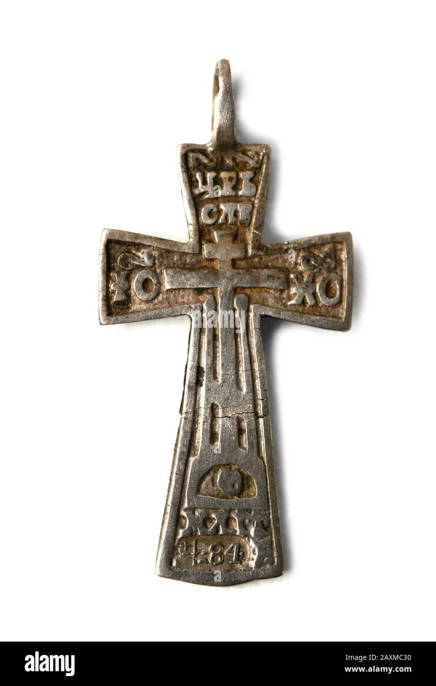 authentic old or ancient small cross isolated on white background Stock