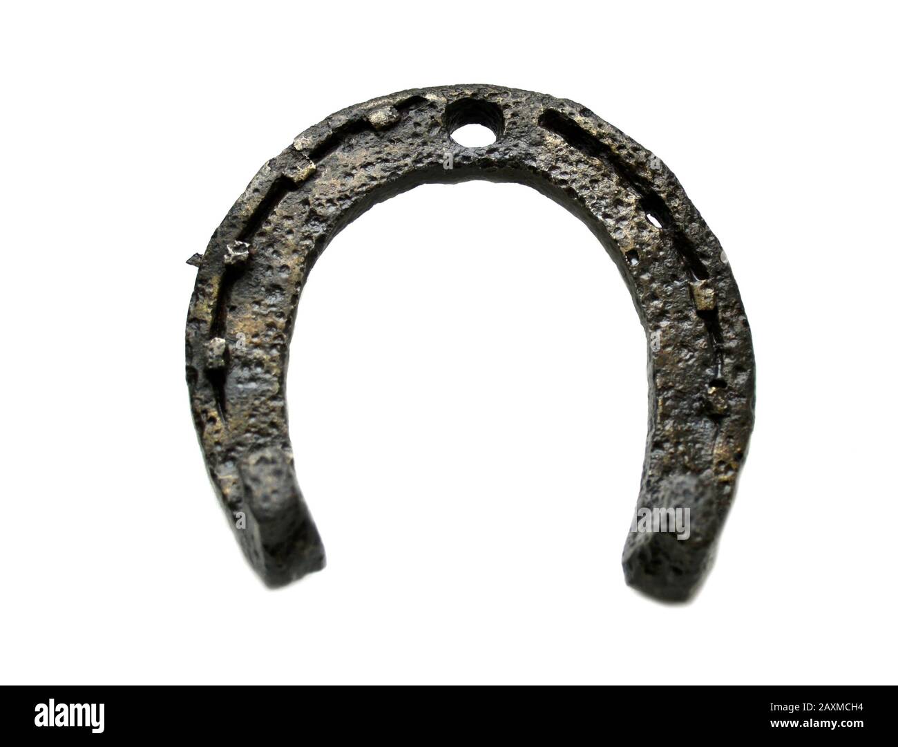 historical and ancient metal horseshoe on a white background Stock Photo