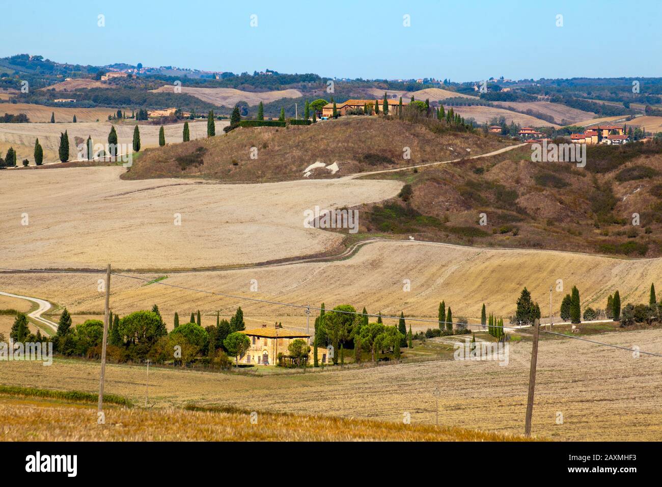 Scenery in the Crete Senesi with houses on hills Stock Photo