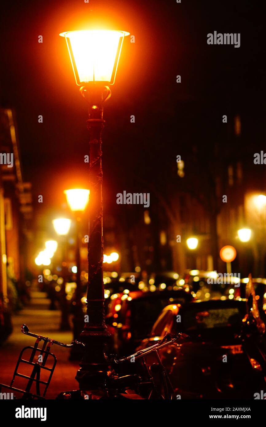 Post top street lamps in a cosy Amsterdam side street Stock Photo
