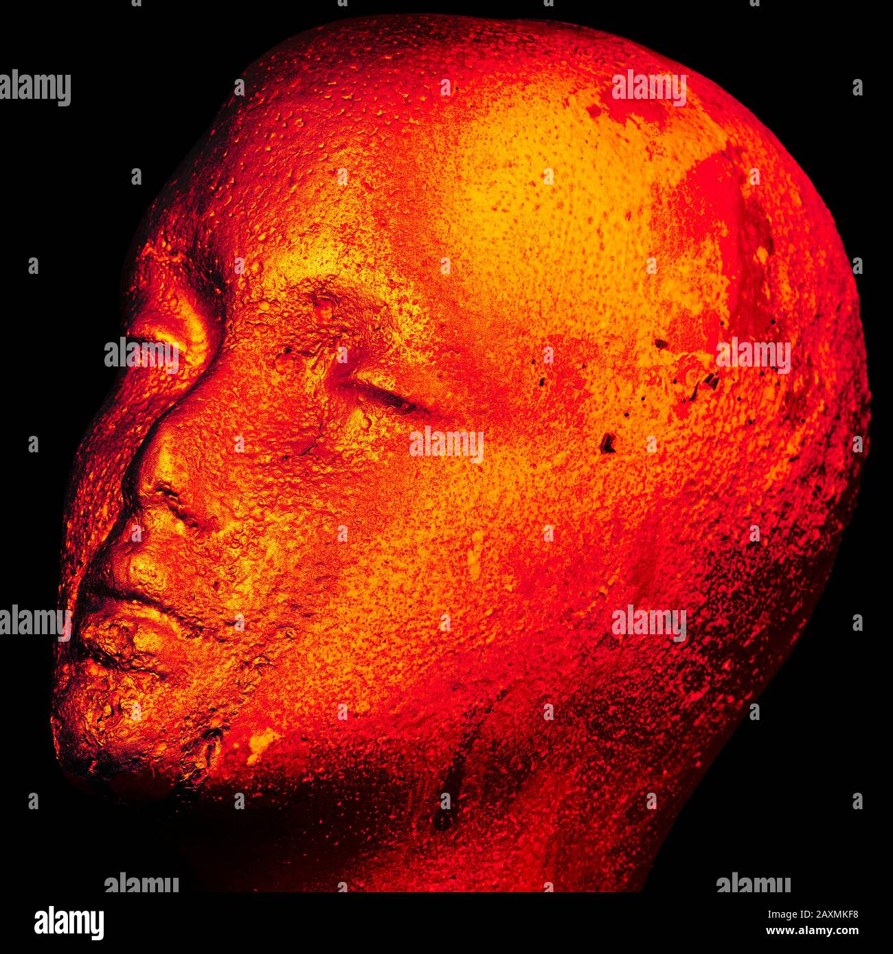 Head melting with heat from fire Stock Photo