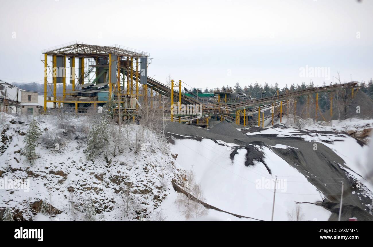 Conveyor platform mining quarry Granik winter snow day Stock Photo