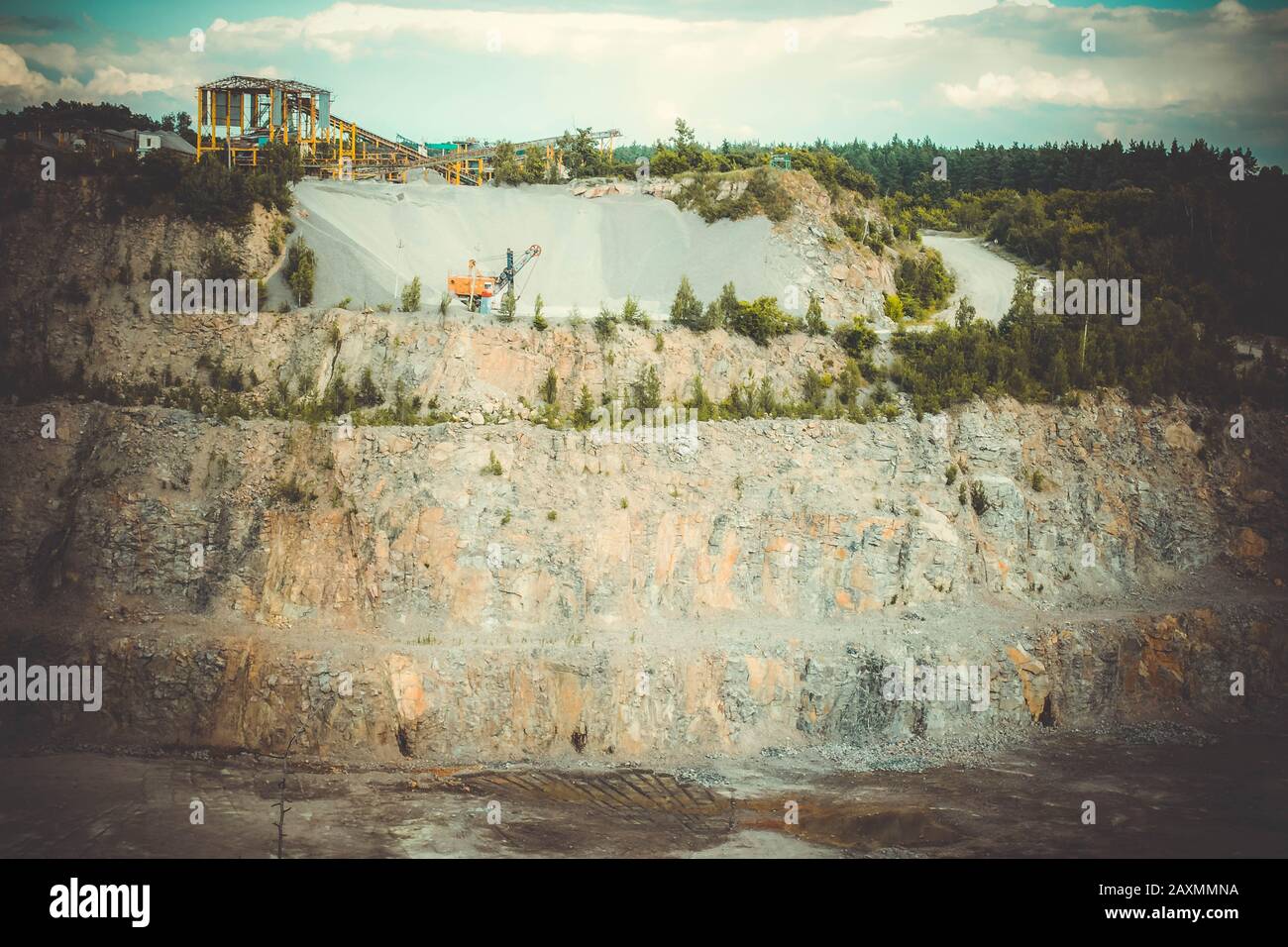 top view of a working granite quarry, filter Stock Photo