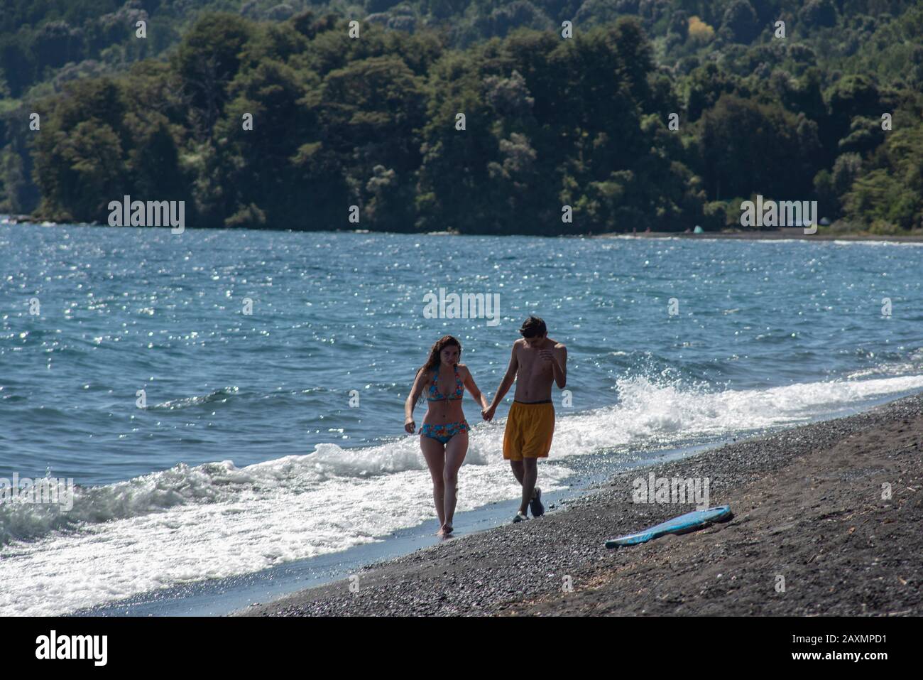 young couple in swimsuit enjoying on a lake Stock Photo