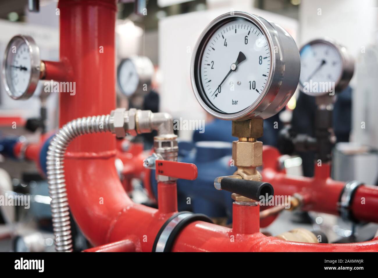 Close up of manometer, pipe, flow meter, water pumps and valves of