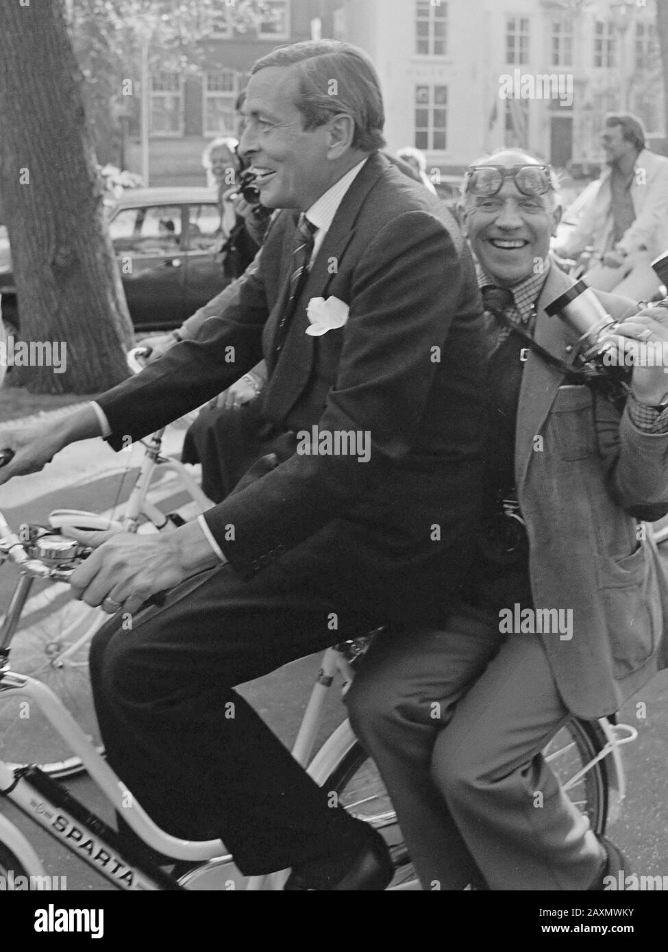 Prince Claus attended the launch of the White Bike WagenPlan ANWB and the Dutch Heart Foundation.   Simon Smit back of the bike in Prince Claus October 25, 1979 Stock Photo