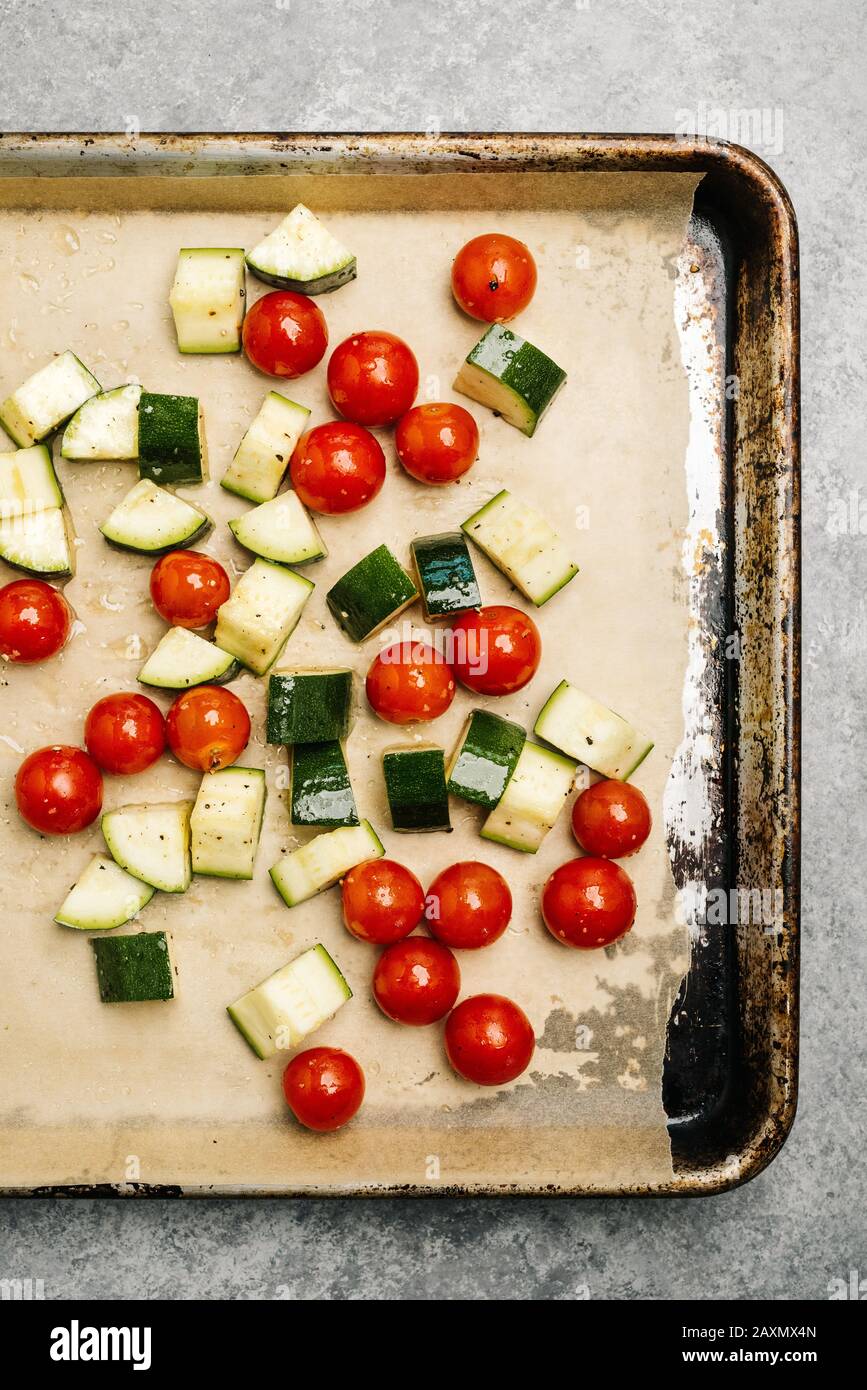 Raw veggies ready for the oven Stock Photo Alamy