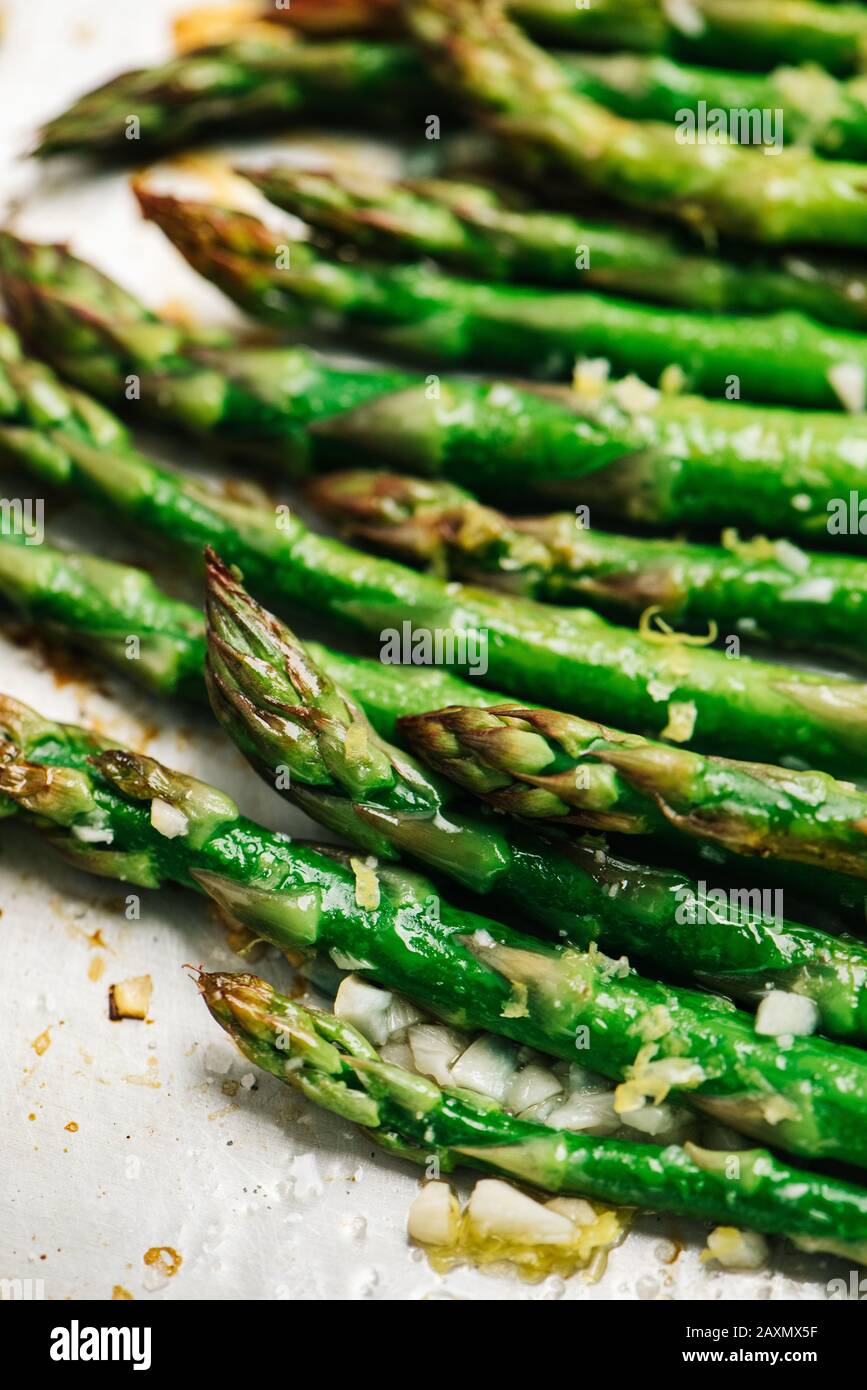 Roasted asparagus with lemon zest and garlic Stock Photo Alamy