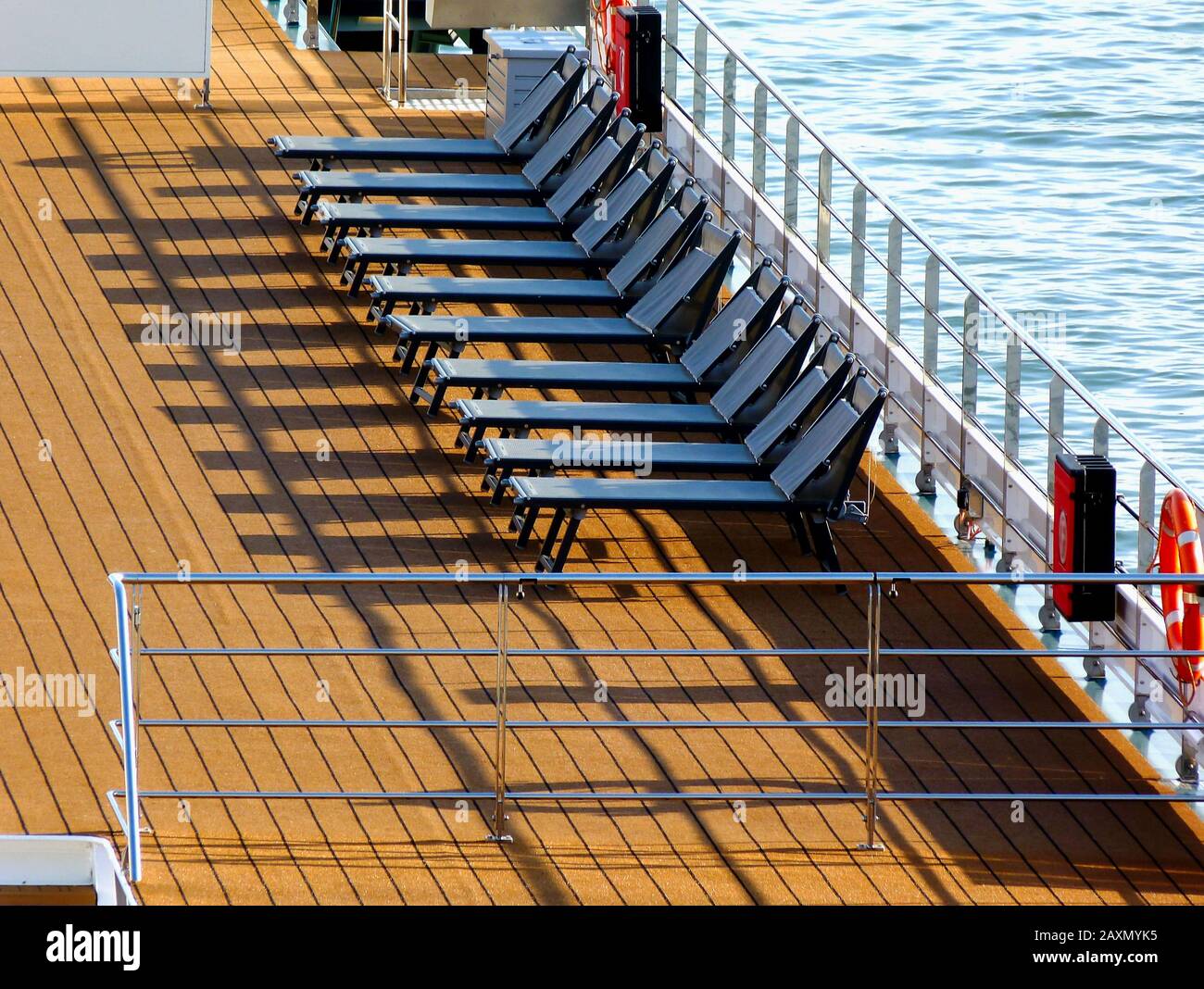 cruise boat upper deck. summer day. inviting brown flooring and lounge