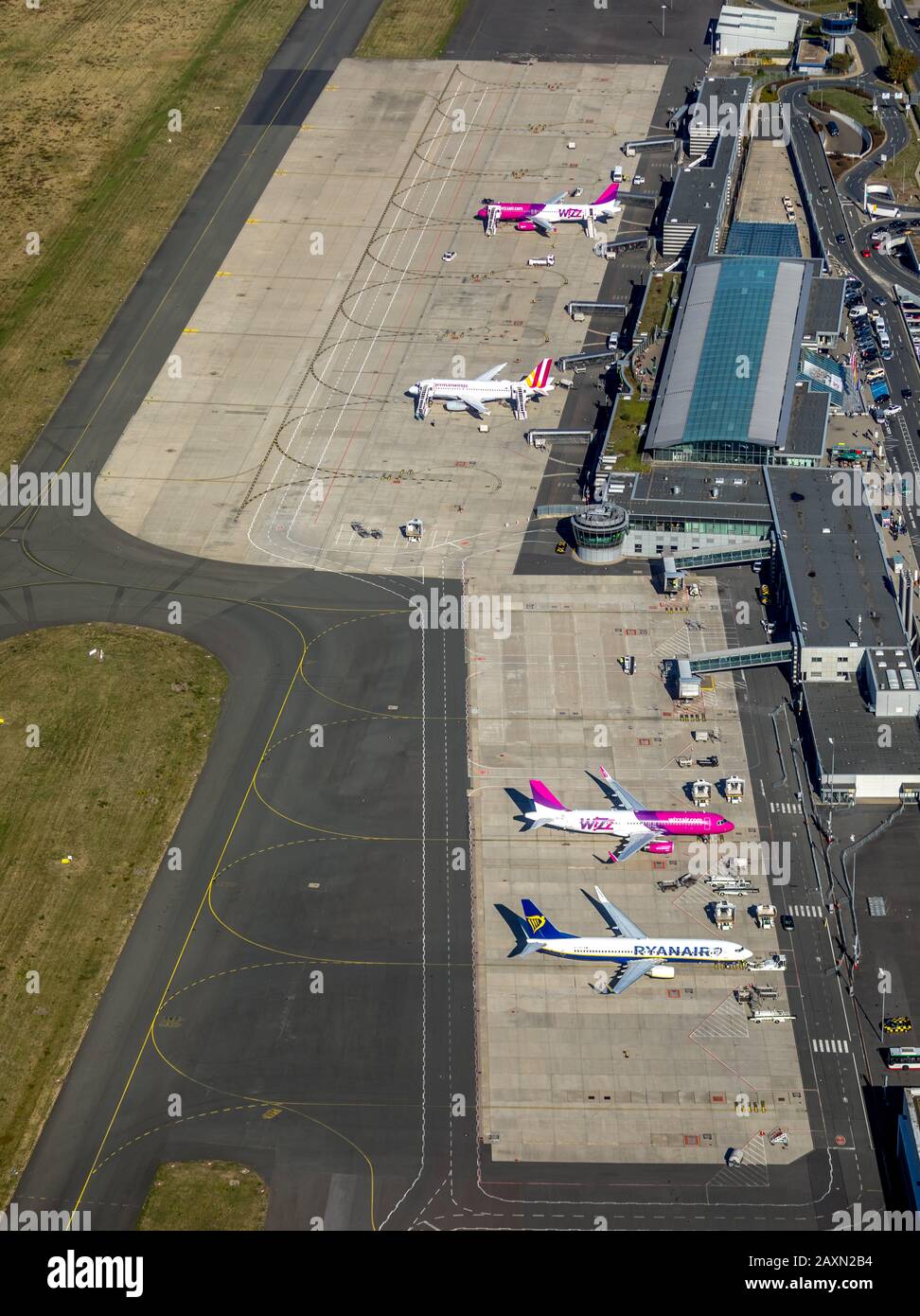 Aerial picture, international airport of Dortmund, DTM, overview over runway 06 and approach, Apron, Natorper avenue, Dortmund, Ruhr area, North Rhine Stock Photo