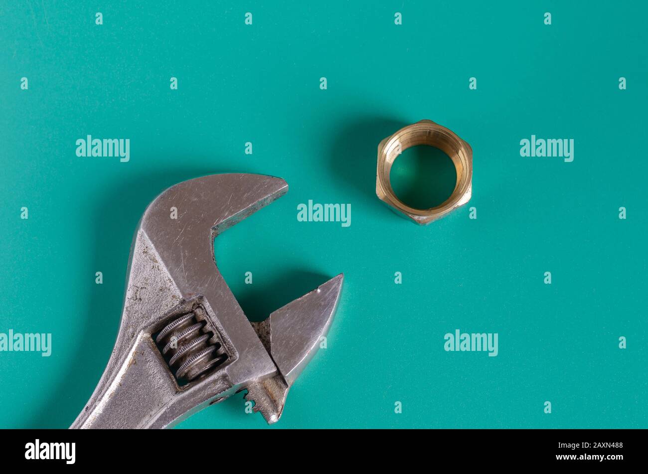 Brass nut for pipe compression fittings. Closeup. Selective focus