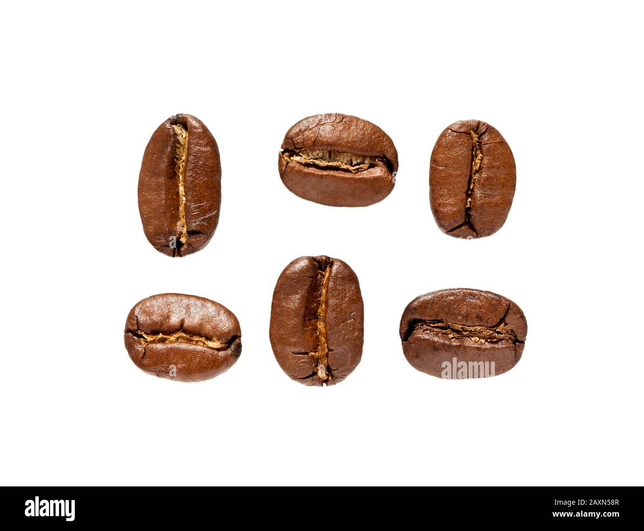 Coffee beans isolated on white background close up. Coffee beans top view. Roasted coffee bean macro. Stock Photo