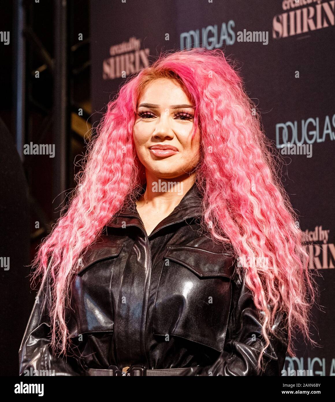 Hamburg, Germany. 12th Feb, 2020. Shirin David, German YouTuberin, singer  and rapper, stands on the stage of a shopping centre during the  presentation of the eau de parfum "Created by Shirin", which