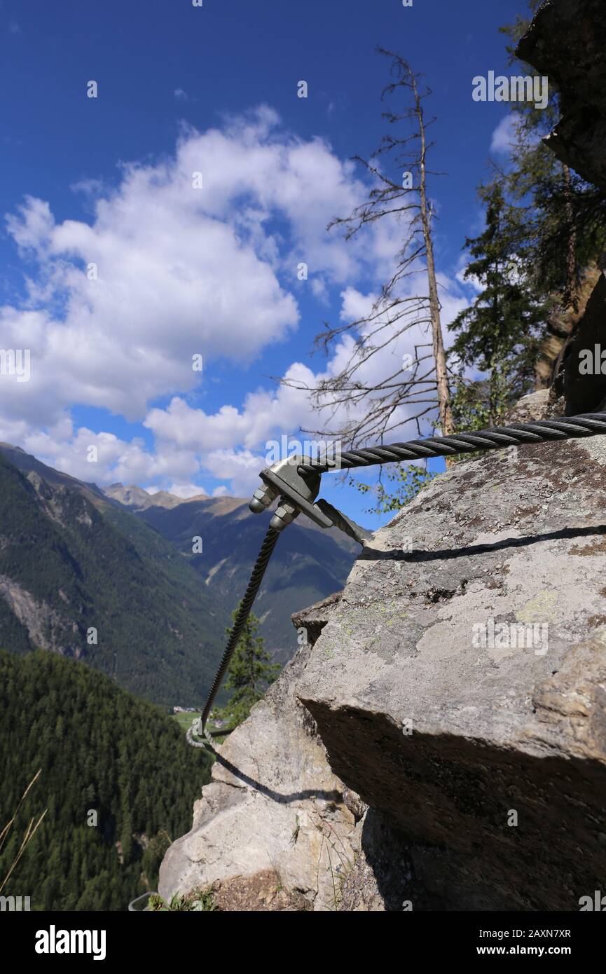 Via ferrata steel rope detail Stock Photo - Alamy