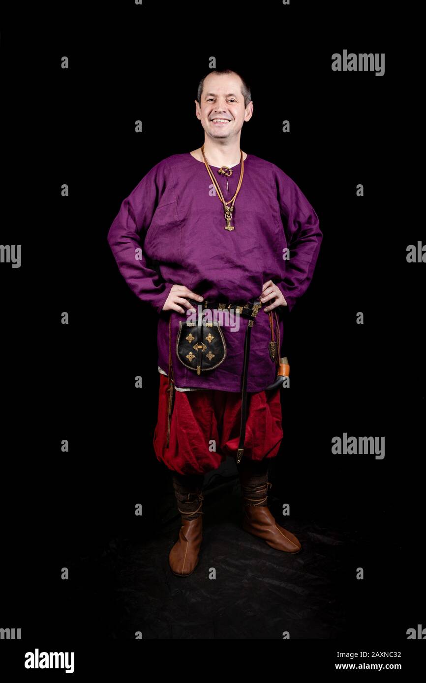 Viking warrior in casual clothes, fulllength studio portrait of a