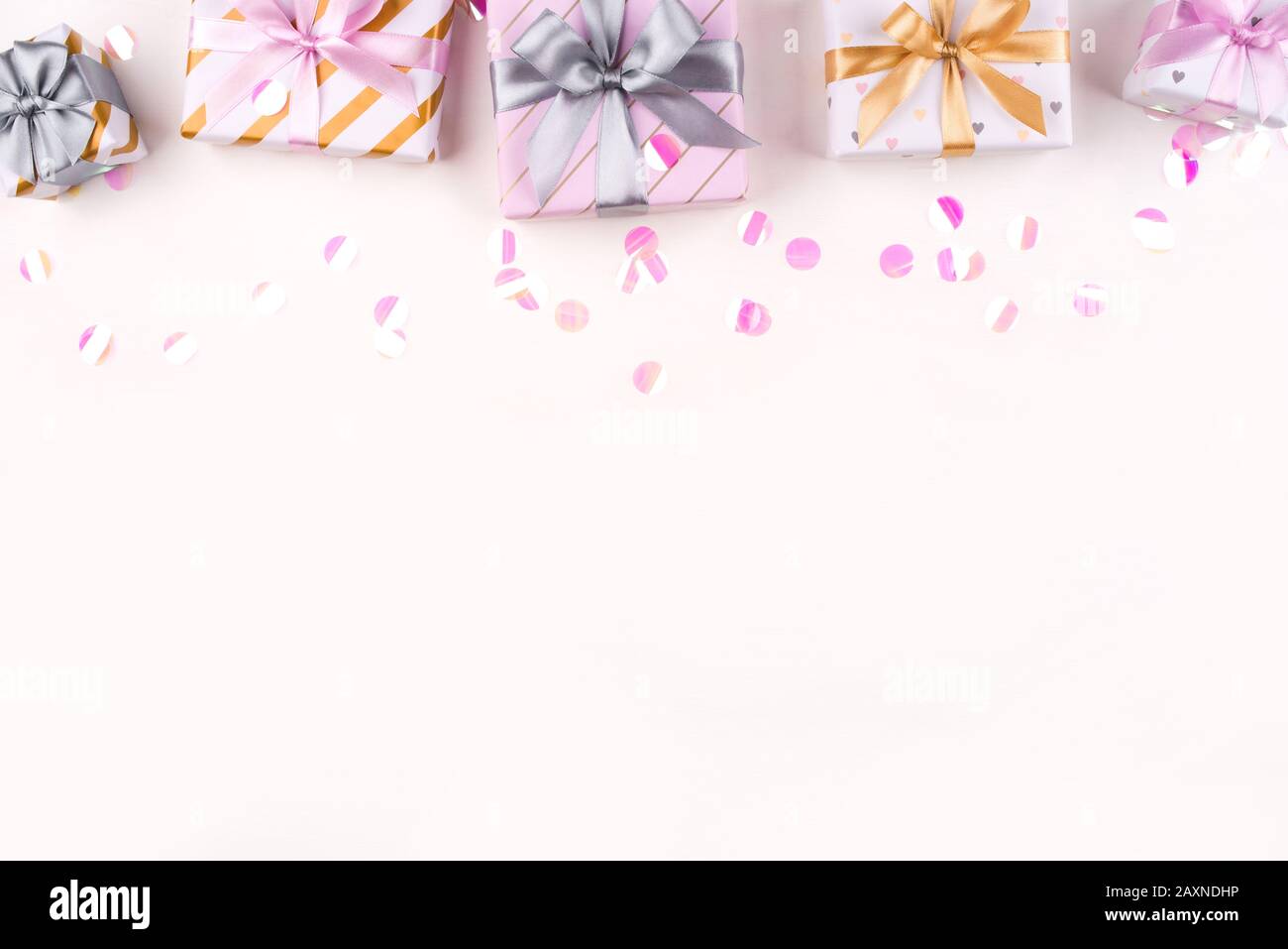 Set of gift boxes with bows and confetti on a white background Stock ...