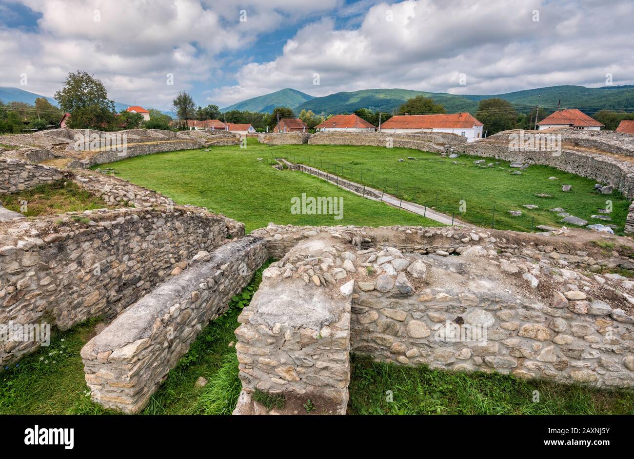 Amphitheatre at Ulpia Traiana, 2nd century Roman Dacia city ruins in village of Sarmizegetusa, Hunedoara County, Transylvania Region, Romania Stock Photo