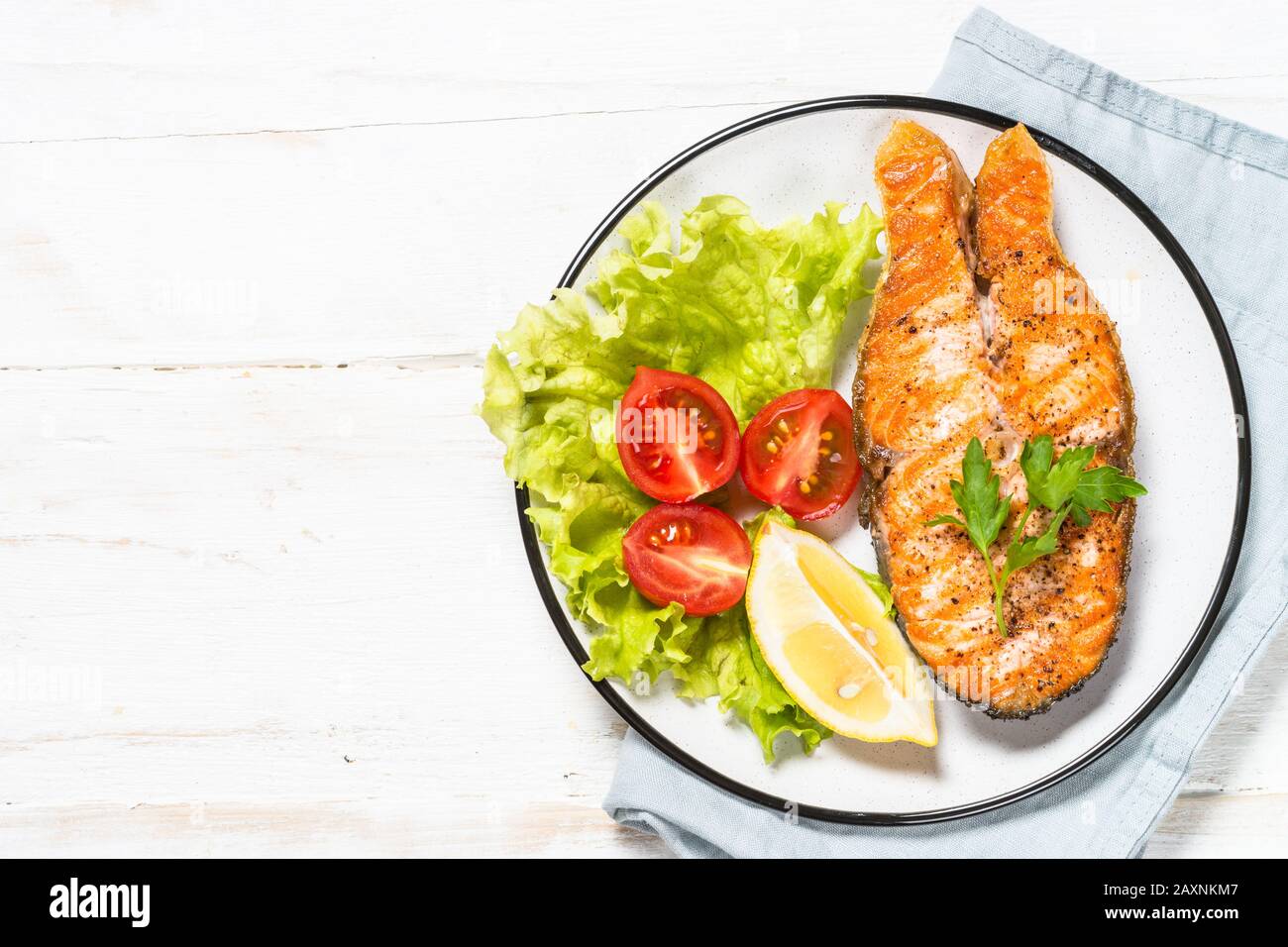 Grilled salmon fish steak on white Stock Photo - Alamy