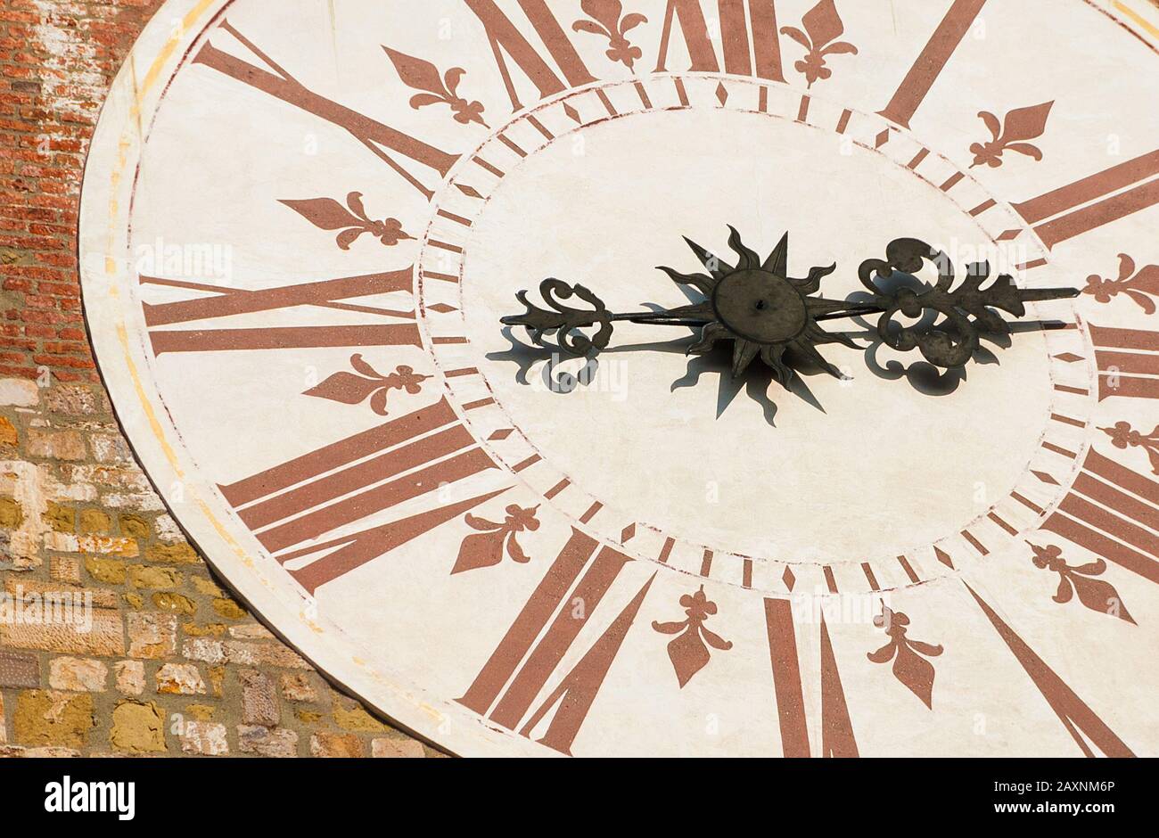 Ancient times and hours. Old clock with roman numbers from Lucca clocktower (18th century) Stock Photo