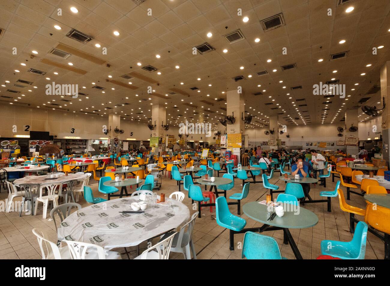 Hong Kong - November, 2019: Empty tables in food court / Cooked Food Centre in Sham Shui Po, Hong Kong Stock Photo