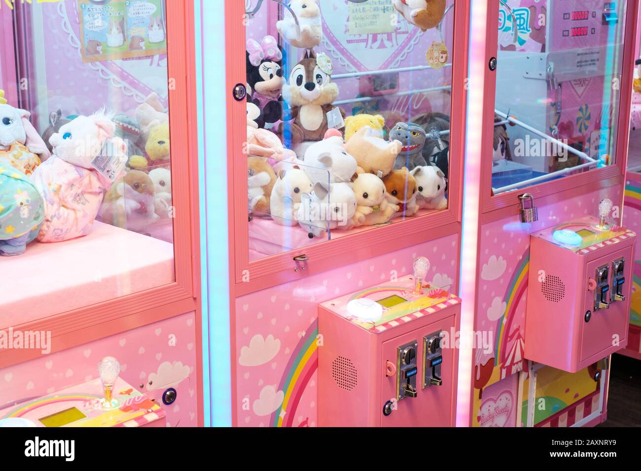 Hong Kong - November, 2019: Slot machine with crane to grab and win soft toys Stock Photo