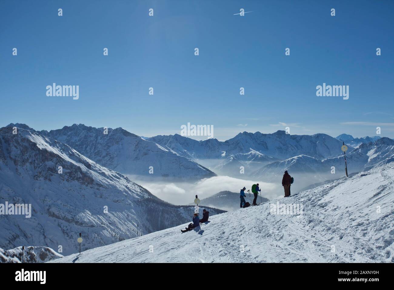 People in front of the ski departure in the Dammkar, Karwendel, Mittenwald, Upper Bavaria, Bavarians, Germany Stock Photo